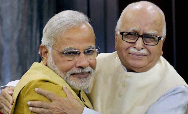 Prime Minister-elect Narendra Modi hugs an emotional LK Advani during the BJP parliamentary party meeting at the Central Hall of Parliament in New Delhi (Photo: PTI) Prime Minister-elect Narendra Modi hugs an emotional LK Advani during the BJP parliamentary party meeting at the Central Hall of Parliament in New Delhi (Photo: PTI)